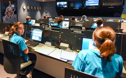 Students working at a space simulator