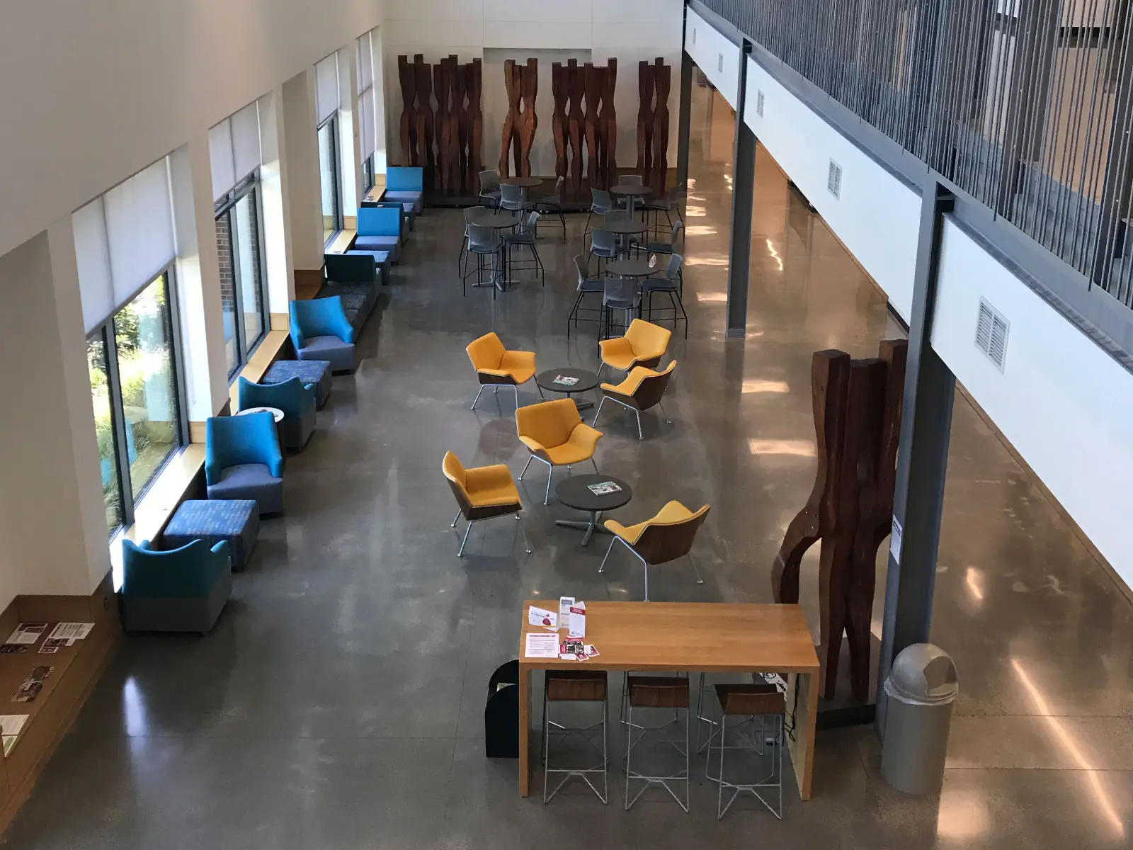 The vast, open-spaced and chair-filled Harmony lobby, with two floors and artwork The vast, open-spaced and chair-filled Harmony lobby, with two floors and artwork